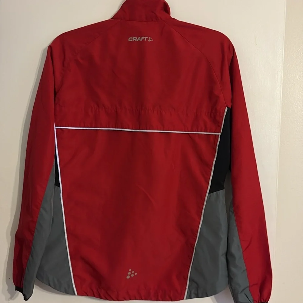 Craft Women’s Red and Gray Performance Windbreaker Jacket. Size M